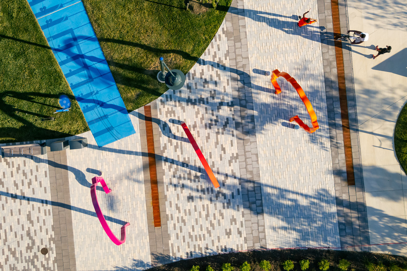 aerial photo of Harmonic Time sculpture by Bruce Willen looking straight down with long shadows