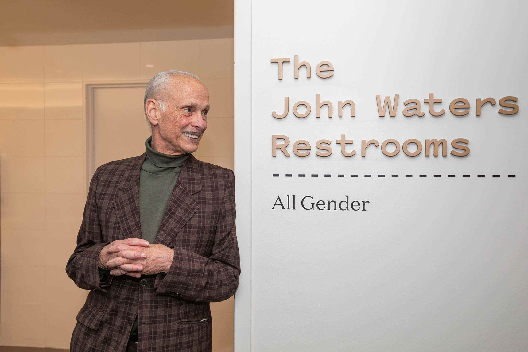 Baltimore Museum of Art brand identity and wayfinding signage John Waters Restrooms, all gender