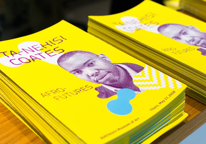Stacks of programs at the Ta-nehisi Coates lecture at the Baltimore Museum of Art's Necessity of Tomorrow Lecture series